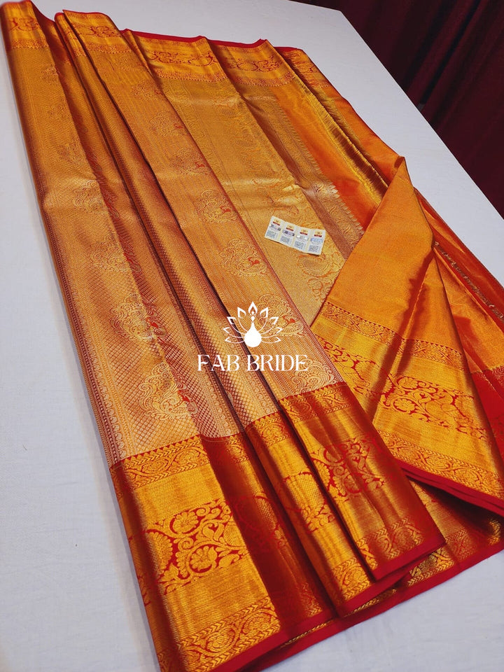 "PEACOCK DANCE IN GOLDEN HOUR" PURE TISSUE SILK KANJIVARAM SAREE