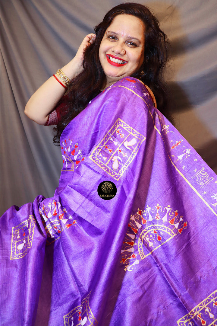 "WARLI ART ON A FINE TUSSAR PURPLE CANVAS" PATTACHITRA SAREE